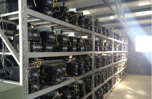 Mining rigs powered by renewable energy sources, highlighting the transformation of Bitcoin mining.